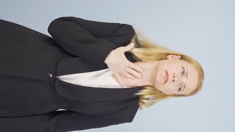 Vertical-video-of-Business-woman-suffering-from-sore-throat.